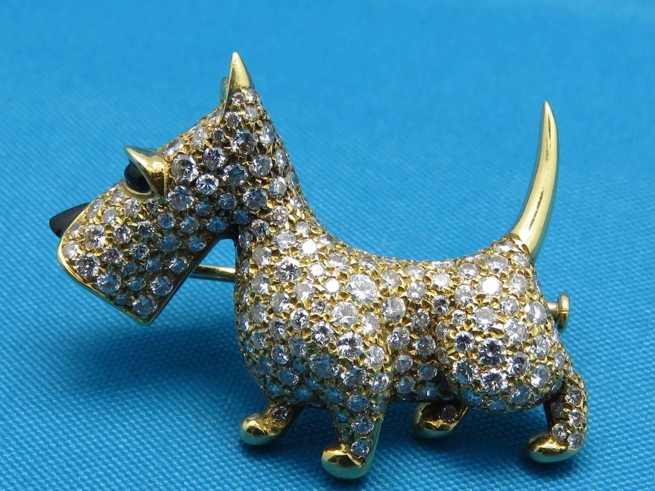 Adorable 18 k Yellow Gold Yorkshire Terrier Pin,with high quality diamonds 
2.80 carats.
Hallmarked 