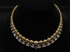 Mauboussin Collier en or jaune et platine avec diamants, 1960