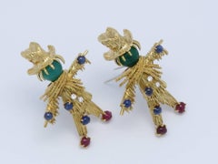 Van Cleef & Arpels Whimsical Gem Set Gold Scarecrow Brooches.