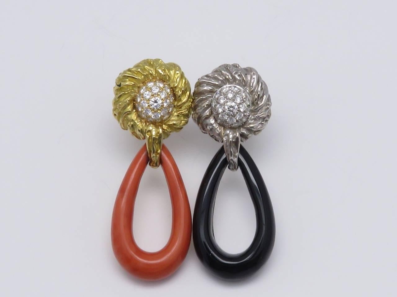 Chaumet , Very Elegant and Chic clip on Earrings.
18K Yellow and White Gold , Coral ,Onyx and Diamond.
Circa 1975.
Measurements:
Length:  2.28 in ( 58mm )
  Width:  0.87 in ( 22mm )
Weight: 47.5 grams
