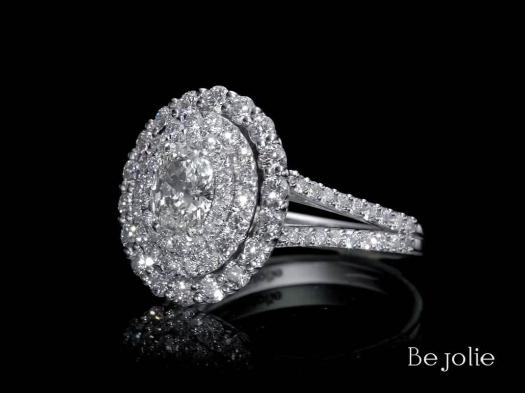Contemporary GIA Certified 2.14 Carat Oval Cut Diamond Triple Halo Engagement Ring G / VVS1 For Sale