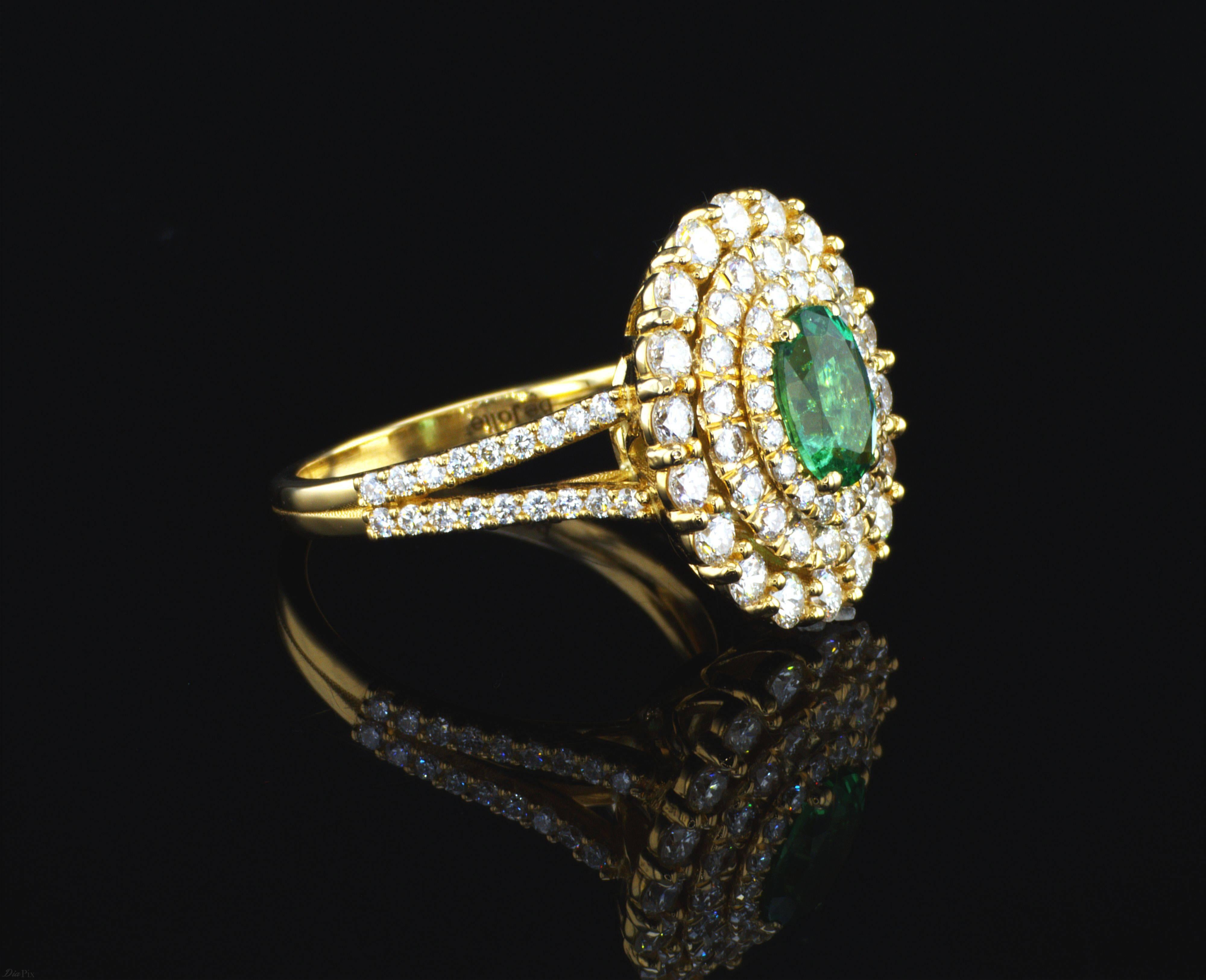 Contemporary 0.80 Carat Natural Emerald engagement Ring with triple Halo diamonds  For Sale