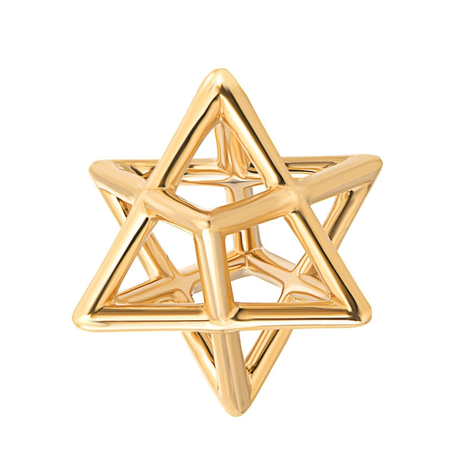 The Merkaba 18K yellow gold necklace, is a heirloom-quality, sacred geometric three dimensional jewelry piece, highlighting superb attention to detail and extraordinary polish, symmetry and equilibrium. It suspends elegantly at the chest, measuring