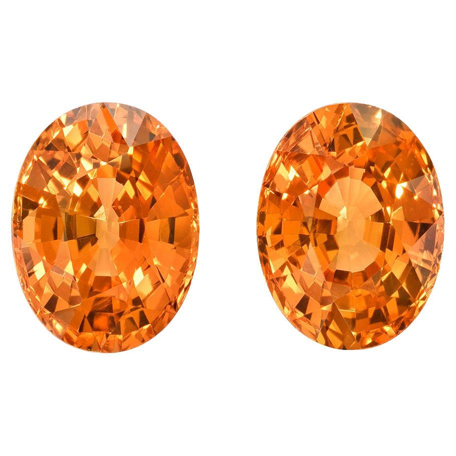 Paire de boucles d'oreilles en grenat mandarin non serti de 3,78 carats, pierres précieuses ovales non serties