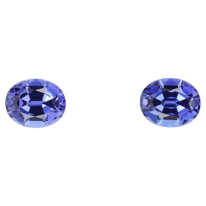 Contemporary Tanzanite Earrings Gemstone Pair 6.70 Carats Oval Loose Gems For Sale