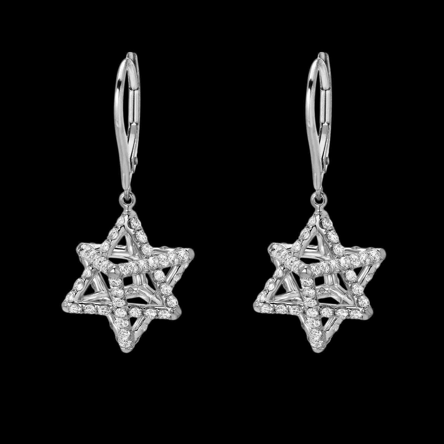 Merkaba platinum drop earrings feature a suspended diamond Merkaba star measuring 0.57 inches, set with a total of approximately 2.02 carats of round brilliant diamonds, F-G color and VVS2-VS1 clarity. These heirloom quality earrings, 1.1 inches in