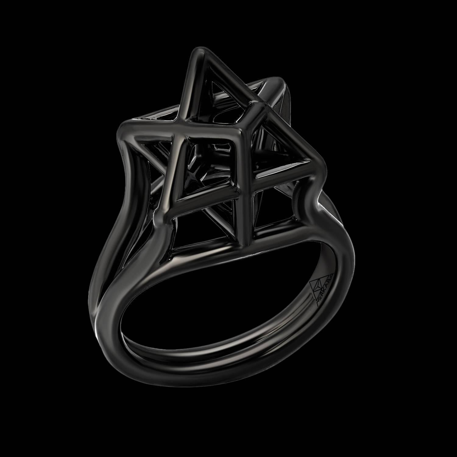 This Merkaba star tetrahedron, black-finished platinum ring, features a dramatic, sculptural design, extending upward from the hand, 0.43 inches, a stunning three-dimensional symbol of universal light.
Size 6. Can be sized to fit.
*Each piece comes