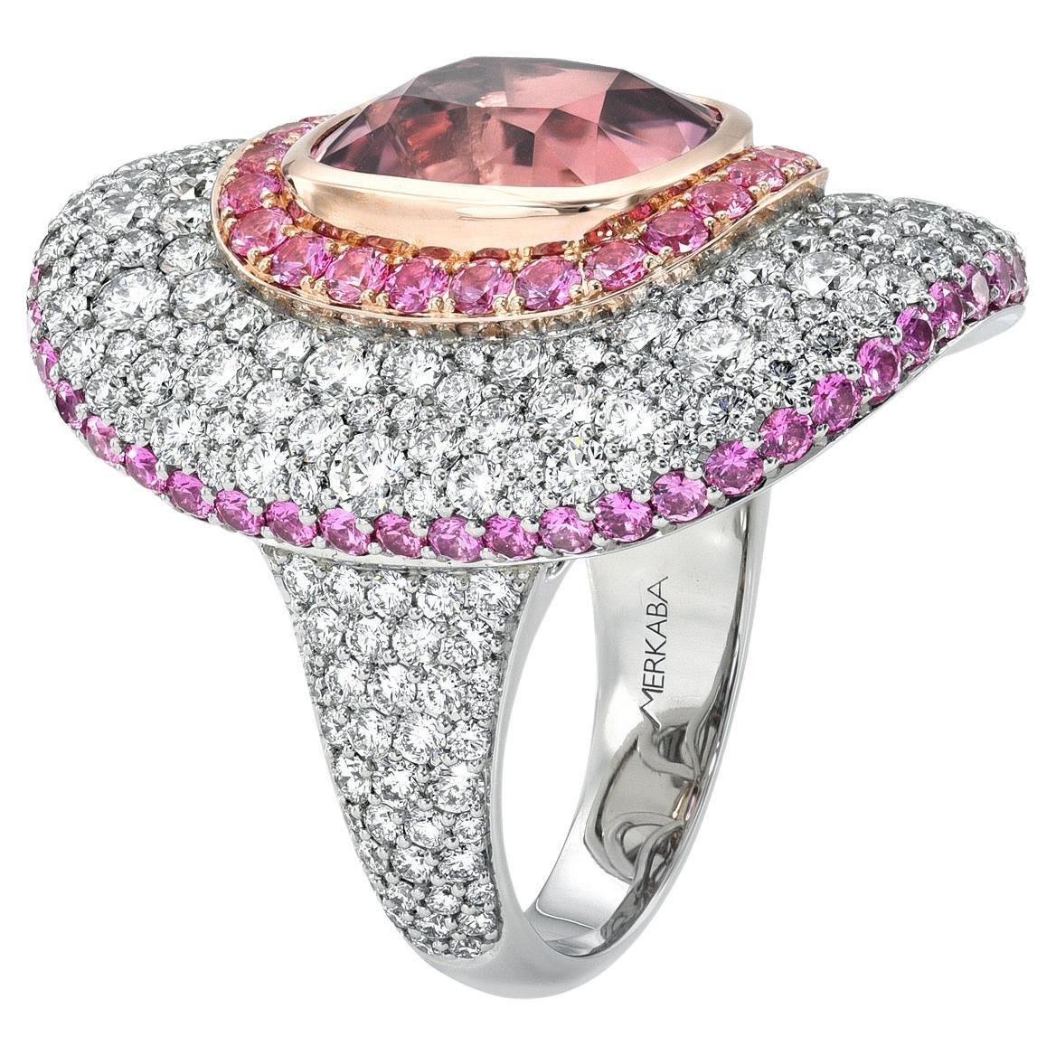 Exclusive Platinum Cocktail Ring with Rare 7.87 Carat Pink Tourmaline and Diamonds by Merkaba Jewelry Beverly Hills.

Elevate your jewelry collection with this extraordinary Platinum Pink Tourmaline ring, a true masterpiece by Merkaba Jewelry