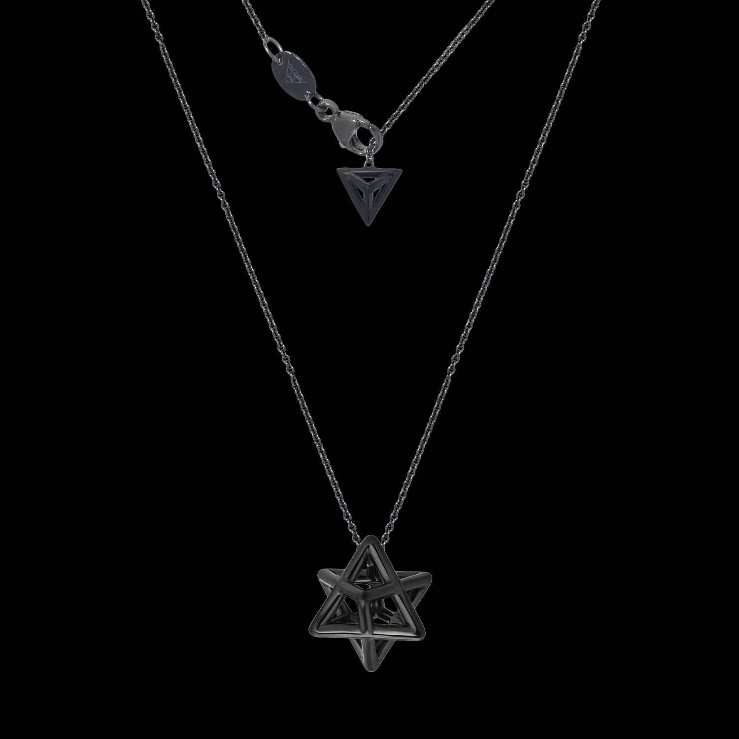 Merkaba black-finished, unisex, platinum necklace, is a heirloom-quality, sacred geometric jewelry piece, highlighting superb attention to detail and extraordinary polish, symmetry and equilibrium. It suspends elegantly at the chest, measuring 0.68