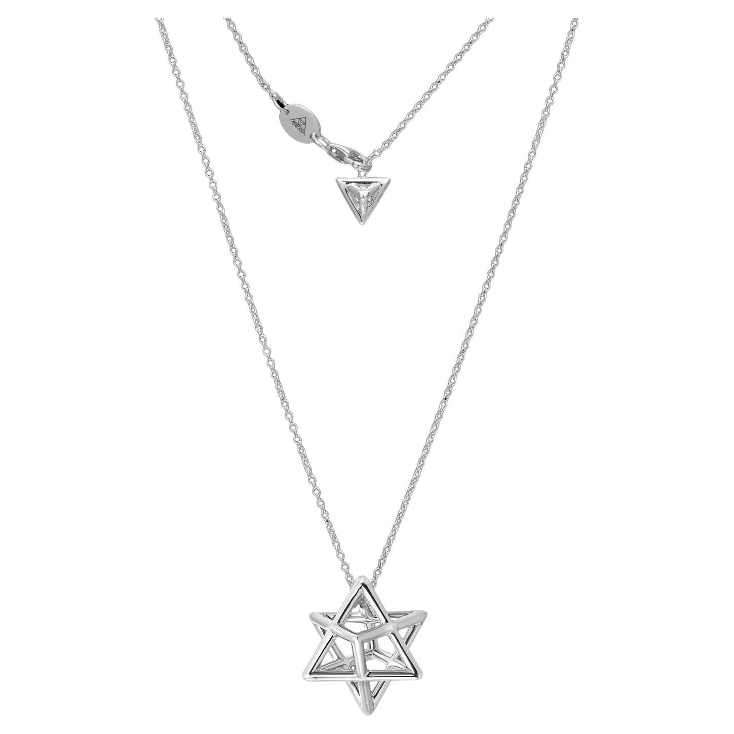 The Merkaba unisex, three dimensional Star of David silver necklace, is an architectural, sacred geometric jewelry piece, highlighting superb attention to detail and extraordinary polish, symmetry, and equilibrium. It suspends elegantly at the