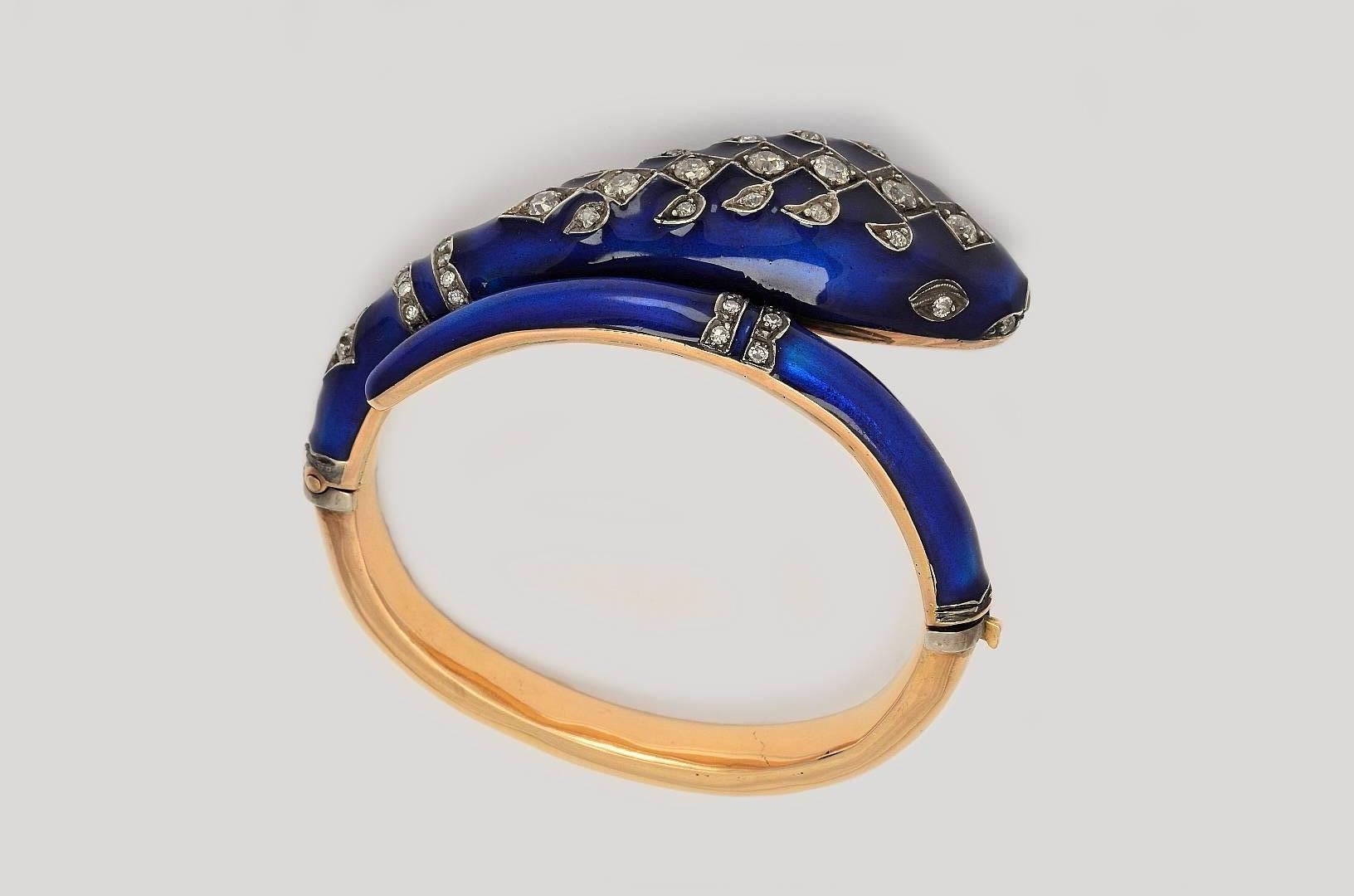 Snake bangle bracelet with silver topped and Gold 18 Kts. backed, with blue enamel and old cut diamonds weighing 2´50 carats.