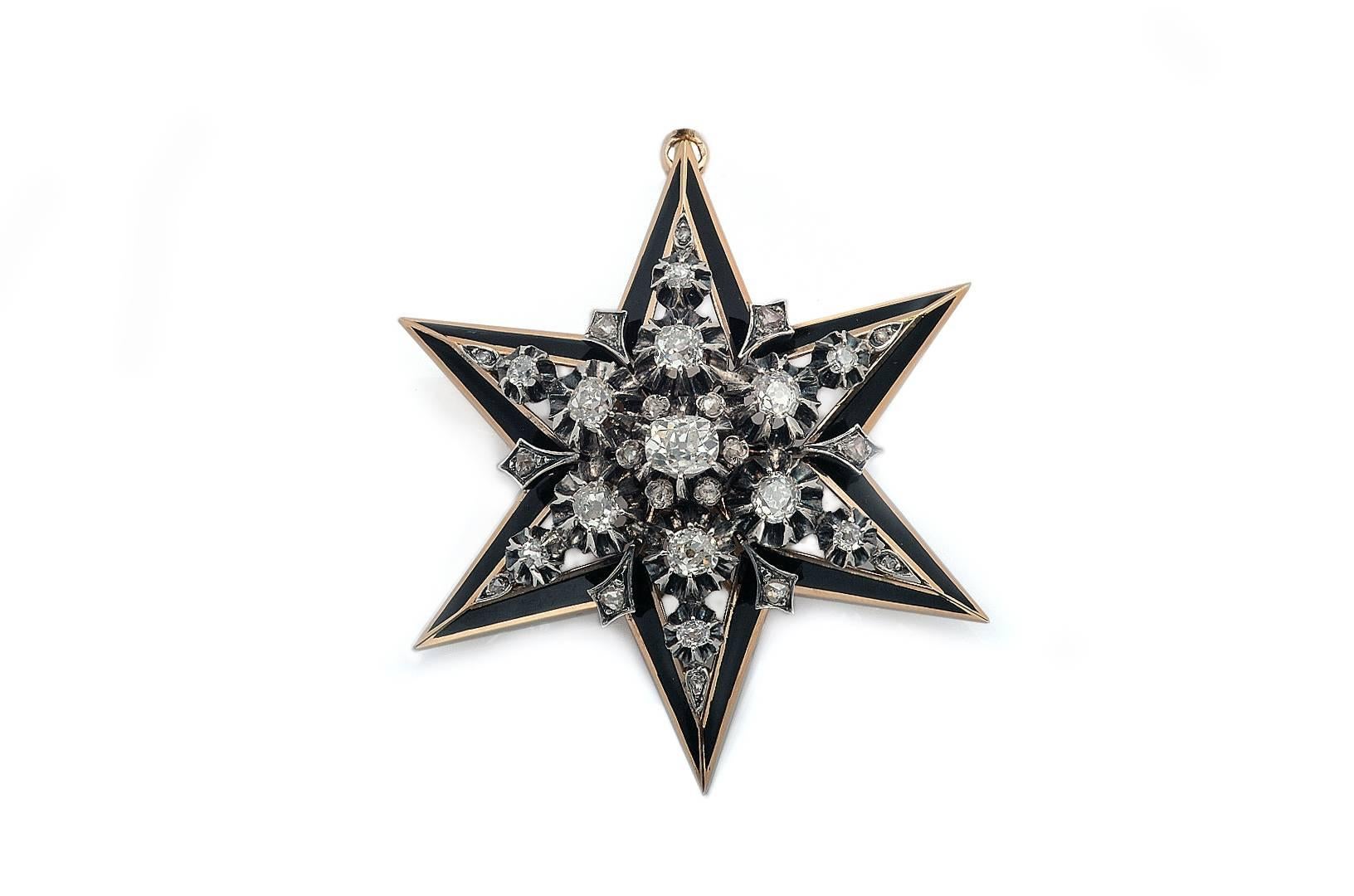 Made of silver and 18 Kts. Gold in the form of a six pointed Star Brooch. It showcases an important cushion cut diamond weighing 0´65 carats aprox., at its center. It´s surrounded by old European-cut diamonds, rose cut-diamonds weighing 2´50 carats