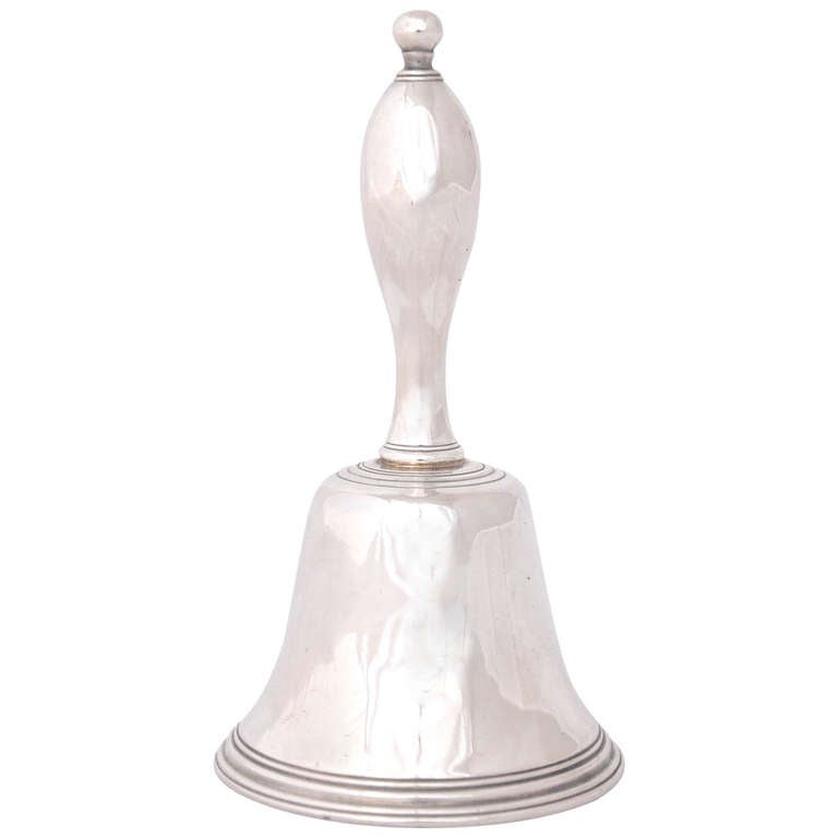 An antique English sterling silver table-bell, which would have originally been used to alert and summon your staff. It was made in London in 1799 by Solomon Hougham and is a lovely example of late 18th Century silver.
It is 11.7cms high and weighs