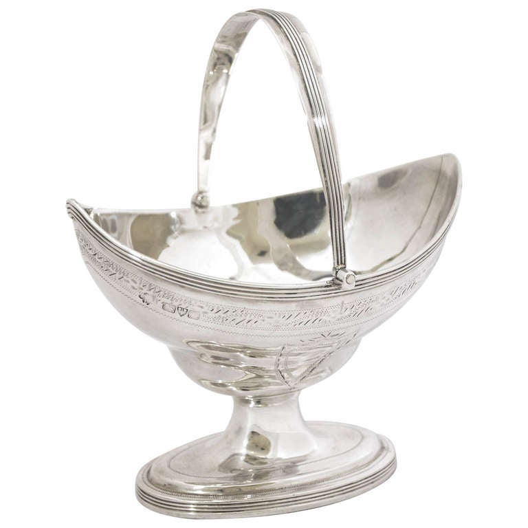 An Edwardian sterling silver basket, hallmarked in the City of Chester in 1908. The basket is beautifully engraved and the total weight is 146gms.