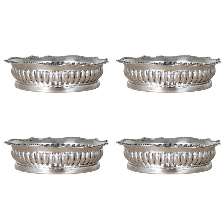 Set of 4 George III Sterling Silver Bottle Coasters