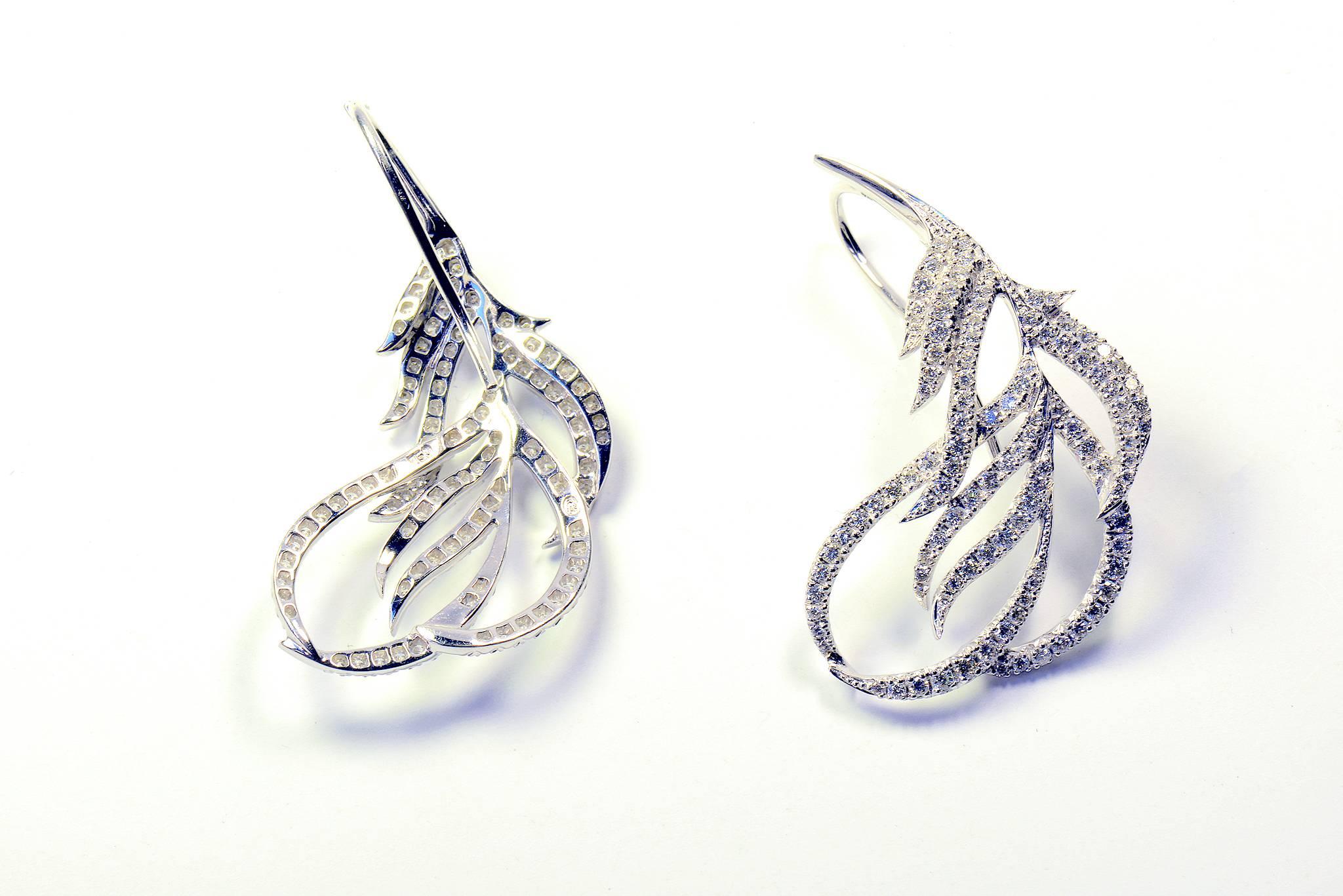 white gold feather earrings