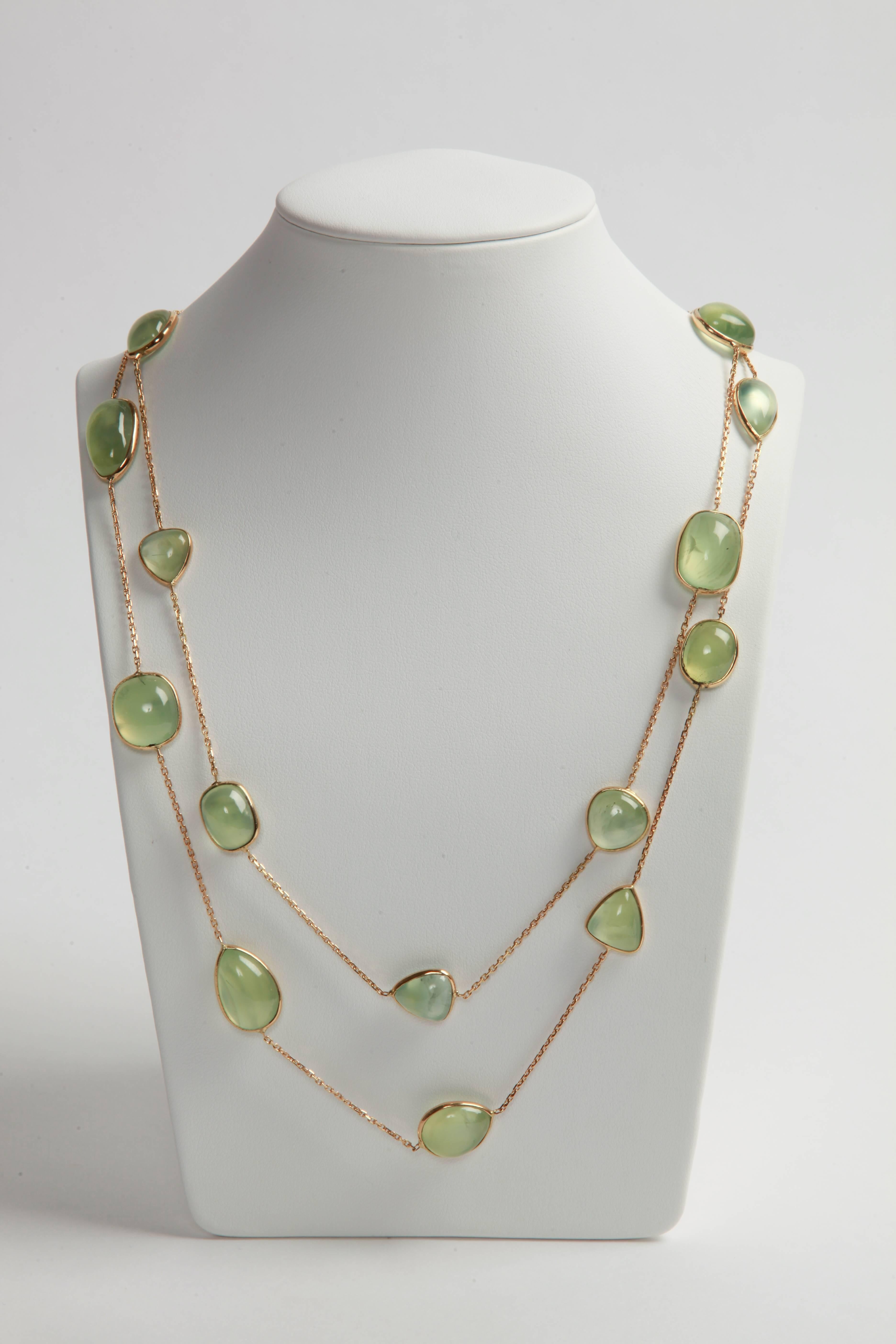 A spring green for this necklace  100cm long, 
Seventeen Prehnite cabochons, weight: 134.20 carats on a 18k yellow gold chain, 
total weight: 38.24grs.
Created by Marion Jeantet, French assay mark.
Price without local taxes.