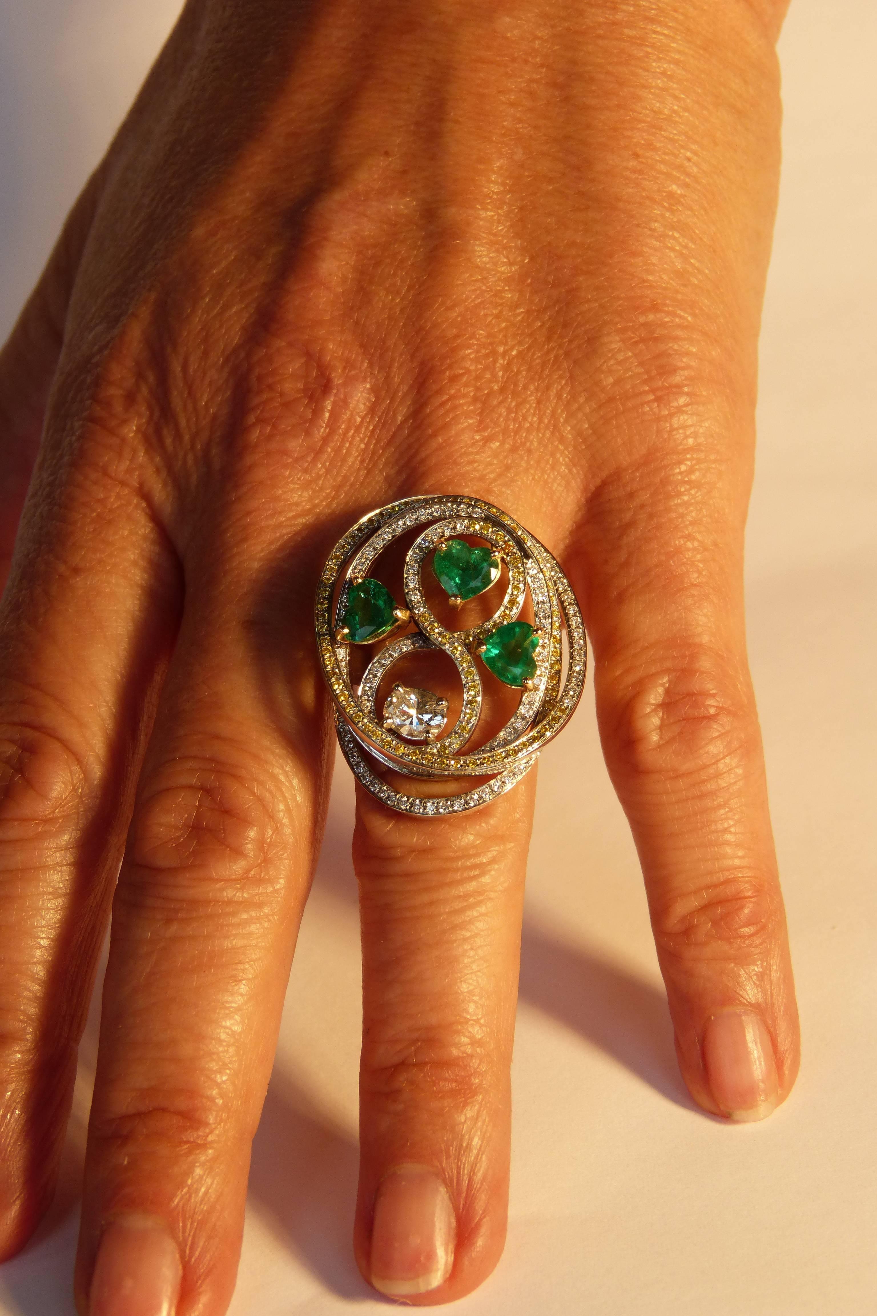 Tourbillon Ring in 18K White Gold Set With Emeralds and Diamonds For Sale 1
