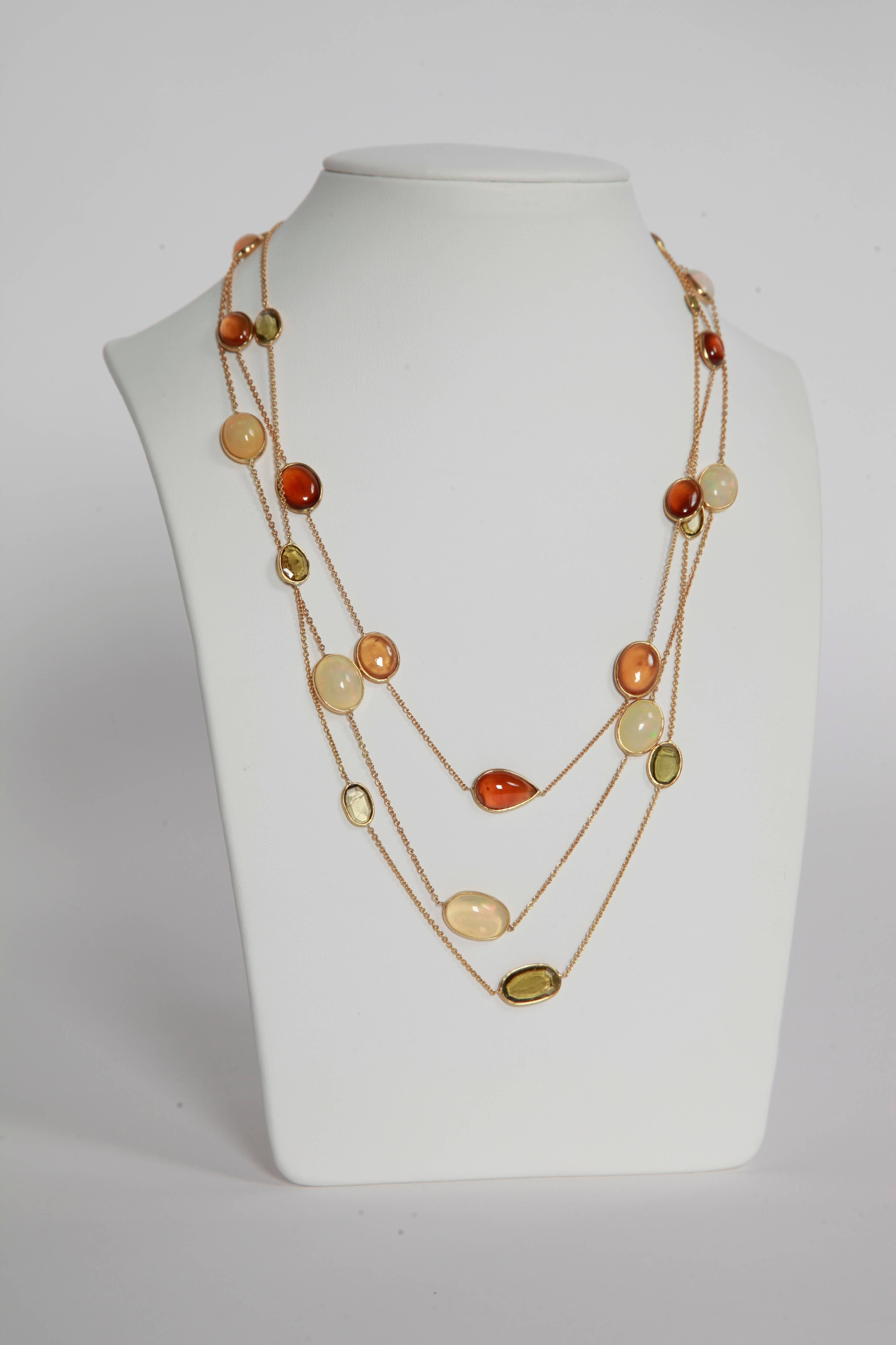 Three necklaces with a luminous cameo of opal cabochons, hessonite garnet cabochons, green tourmalines flat cut.
Can be sold séparatly.
French assay mark
Price without local taxes.
Total stones 's weight: 43.03carats