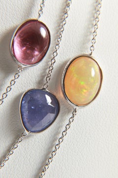 Three White Gold Necklaces with Pink Tourmalines, Opales, Tanzanites