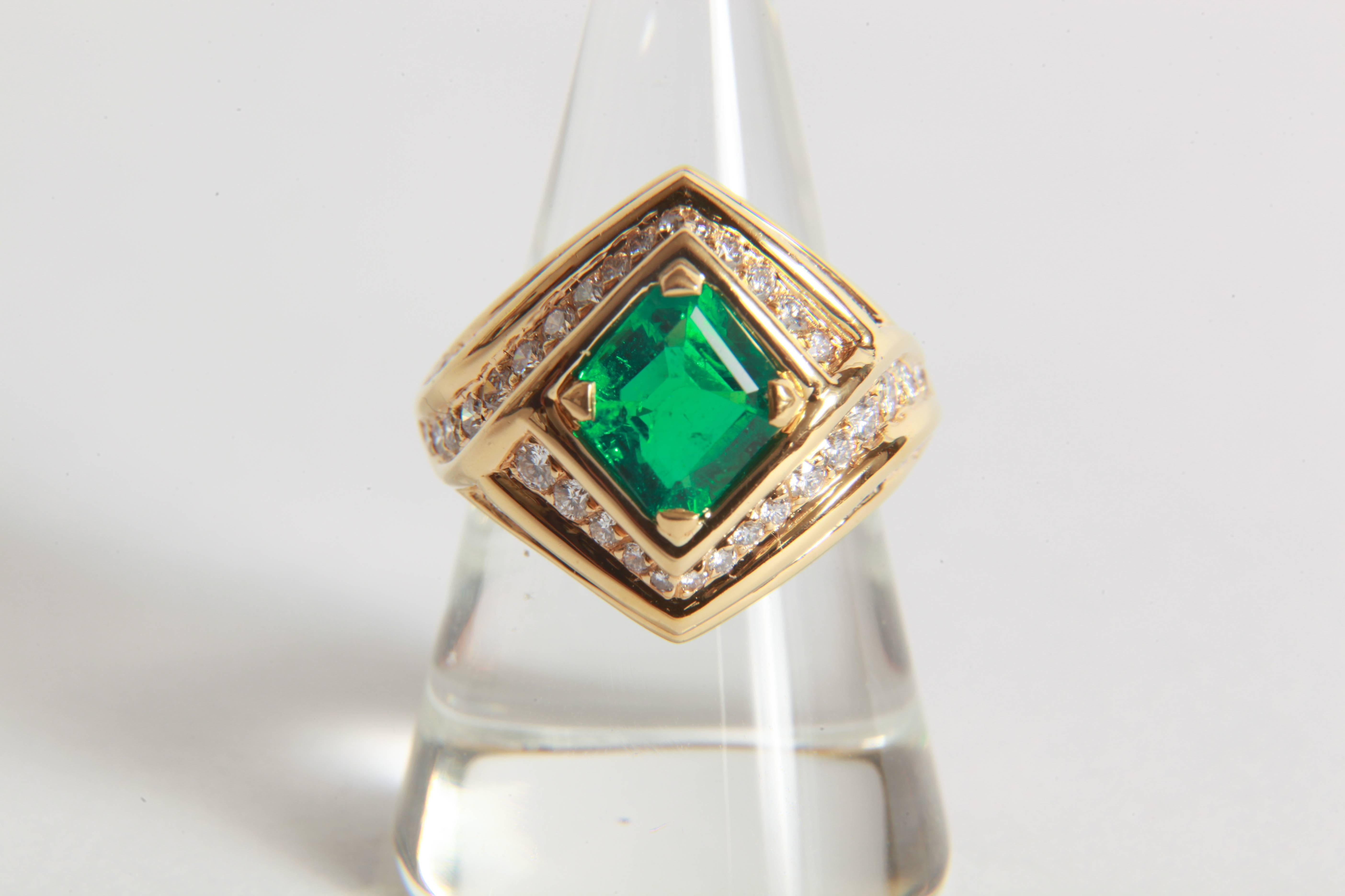 Contemporary 18K Yellow gold, Emerald 1, 23 carats and Diamond Ring by Marion Jeantet For Sale