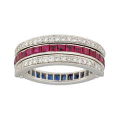 A Sapphire, Ruby and Diamond Swivel Eternity Ring