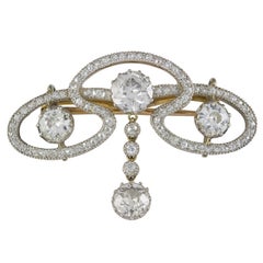 An Art Nouveau Diamond Scroll Brooch