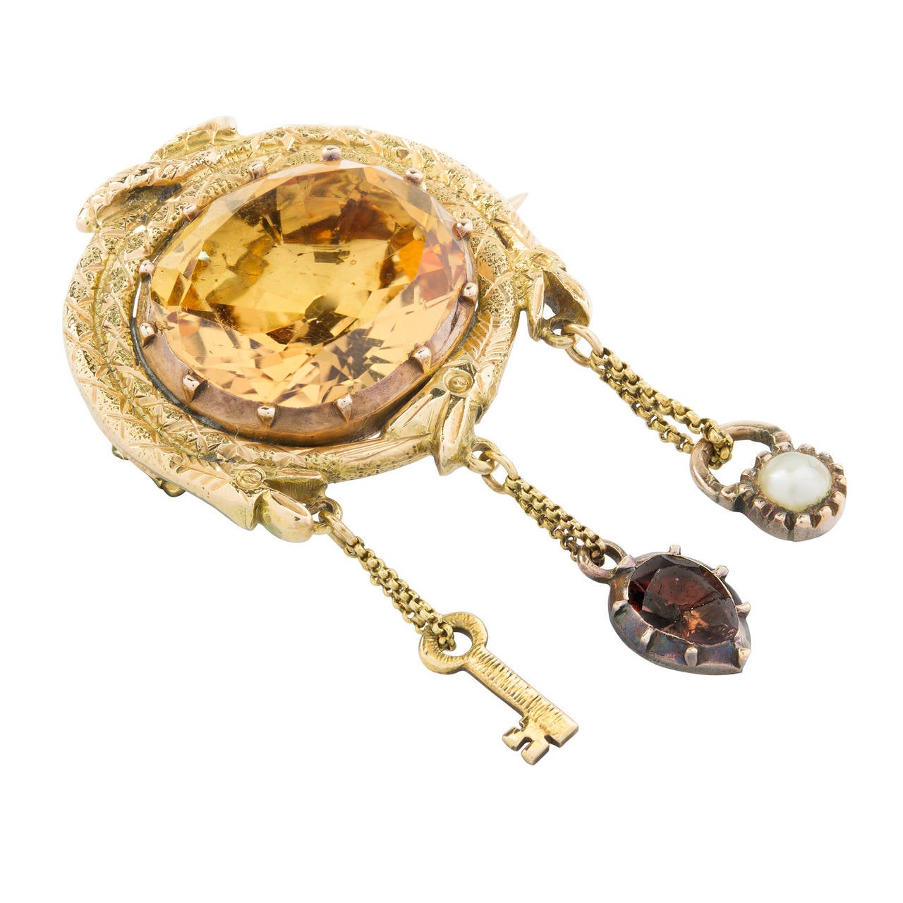 A late Georgian topaz brooch, the brooch set with a central oval-shaped faceted golden topaz, measuring approximately 13.5 x 11.7 mm, rose gold cut-down collet set to a border of entwined yellow gold serpents, suspending a pearl padlock, a yellow