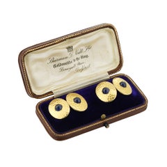 Une paire de boutons de manchette édouardiens en saphir et or