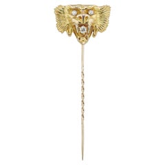 An early 20th century lion-head stick-pin