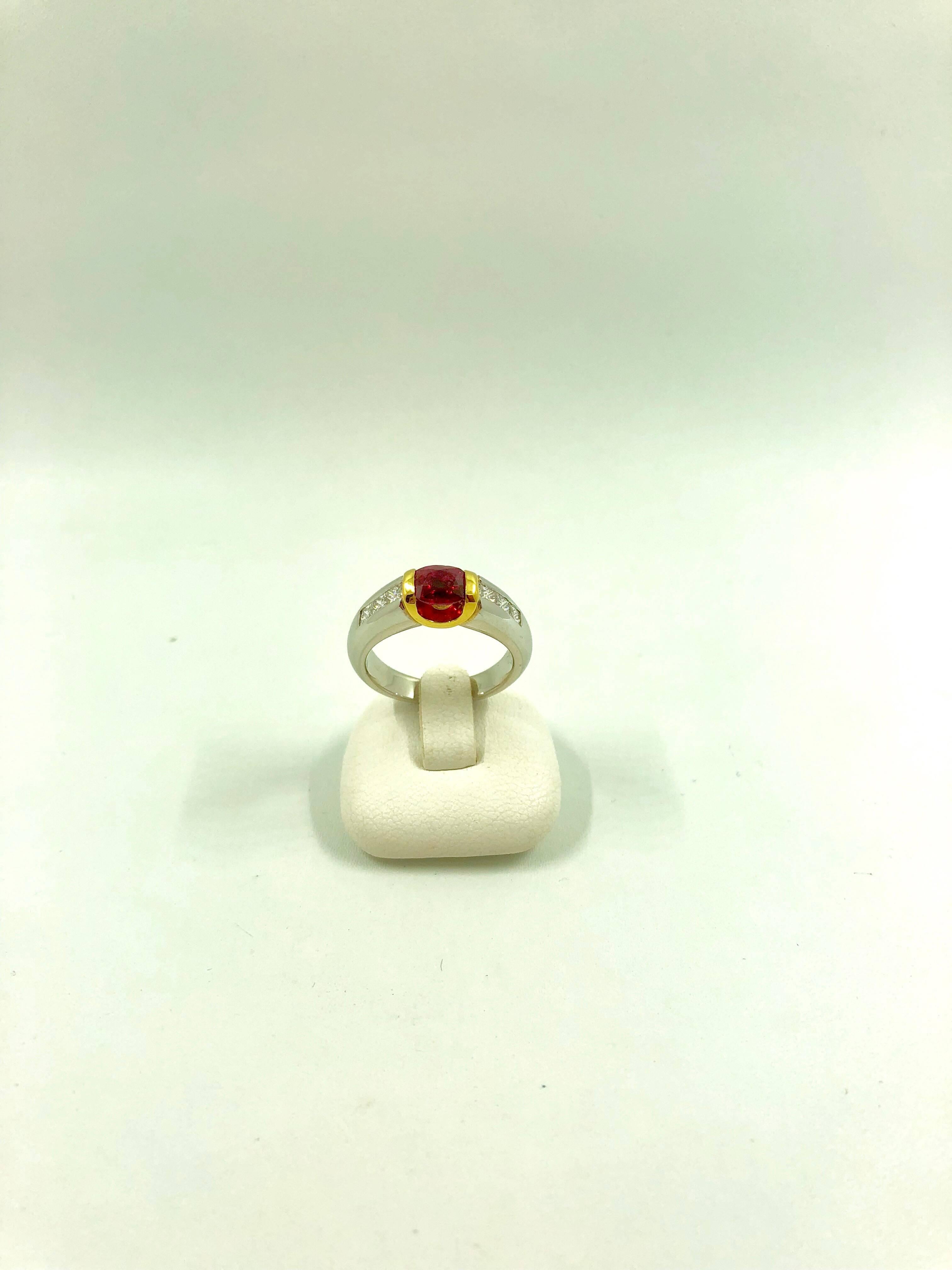 A white and gold ring set in the middle with a magnificent vivid red ruby, surrounded by three princess cut diamonds on each side.
the ring is a G.MINNER unique creation entirely handmade.
Ruby Weight: 1.08 carat
Diamonds Weight: 0.44 carat
Net