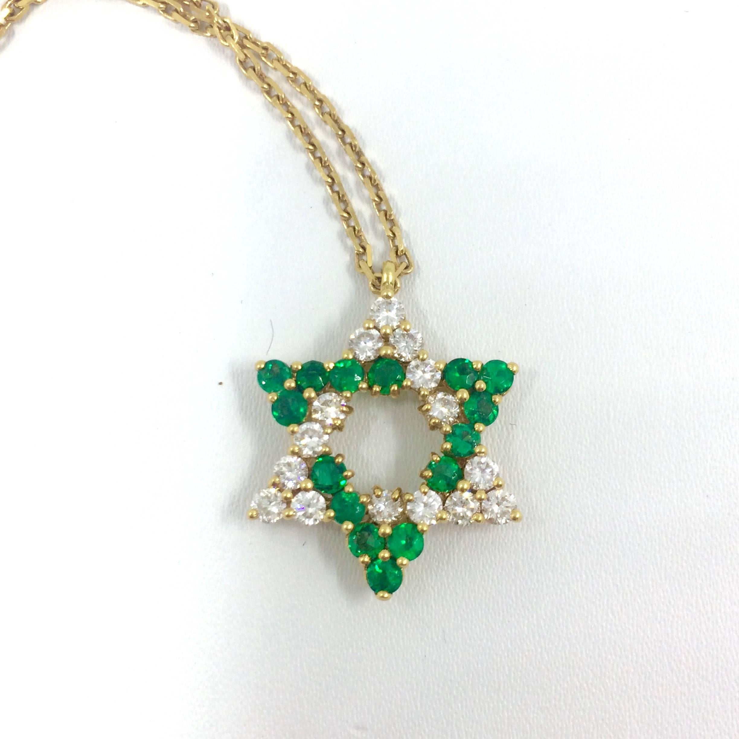 A yellow gold star of David necklace set with 15 brilliant cut emeralds and 15 brilliant cut diamonds.
Total Diamonds Weight: 0,85 carat
Total Emeralds Weight: 0,83 carat
Pendant Weight: 3,70 grams
Chain Weight: 3,60 grams
Chain Lenght: 40