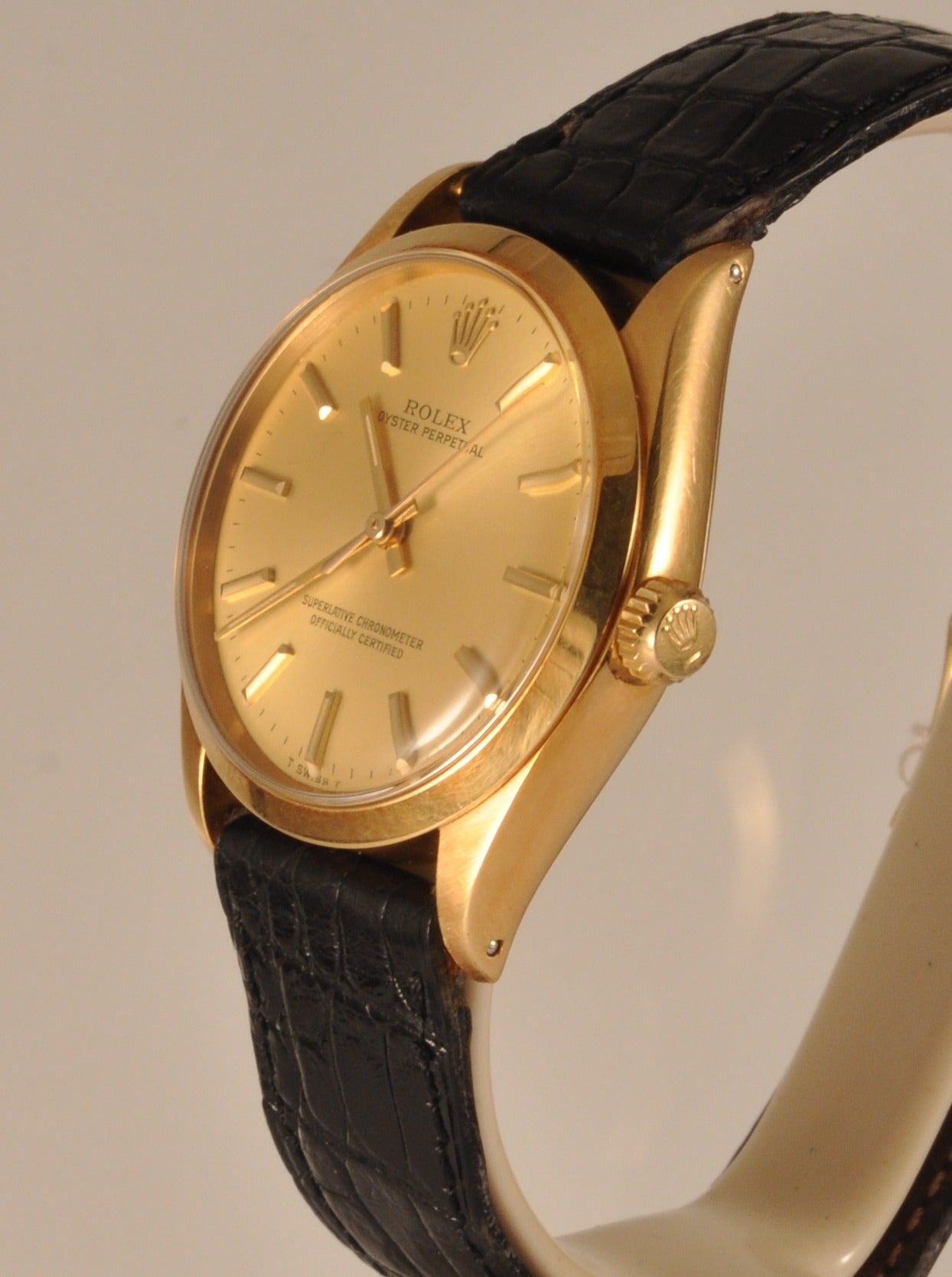 Rolex 18k yellow gold self-winding wristwatch.
