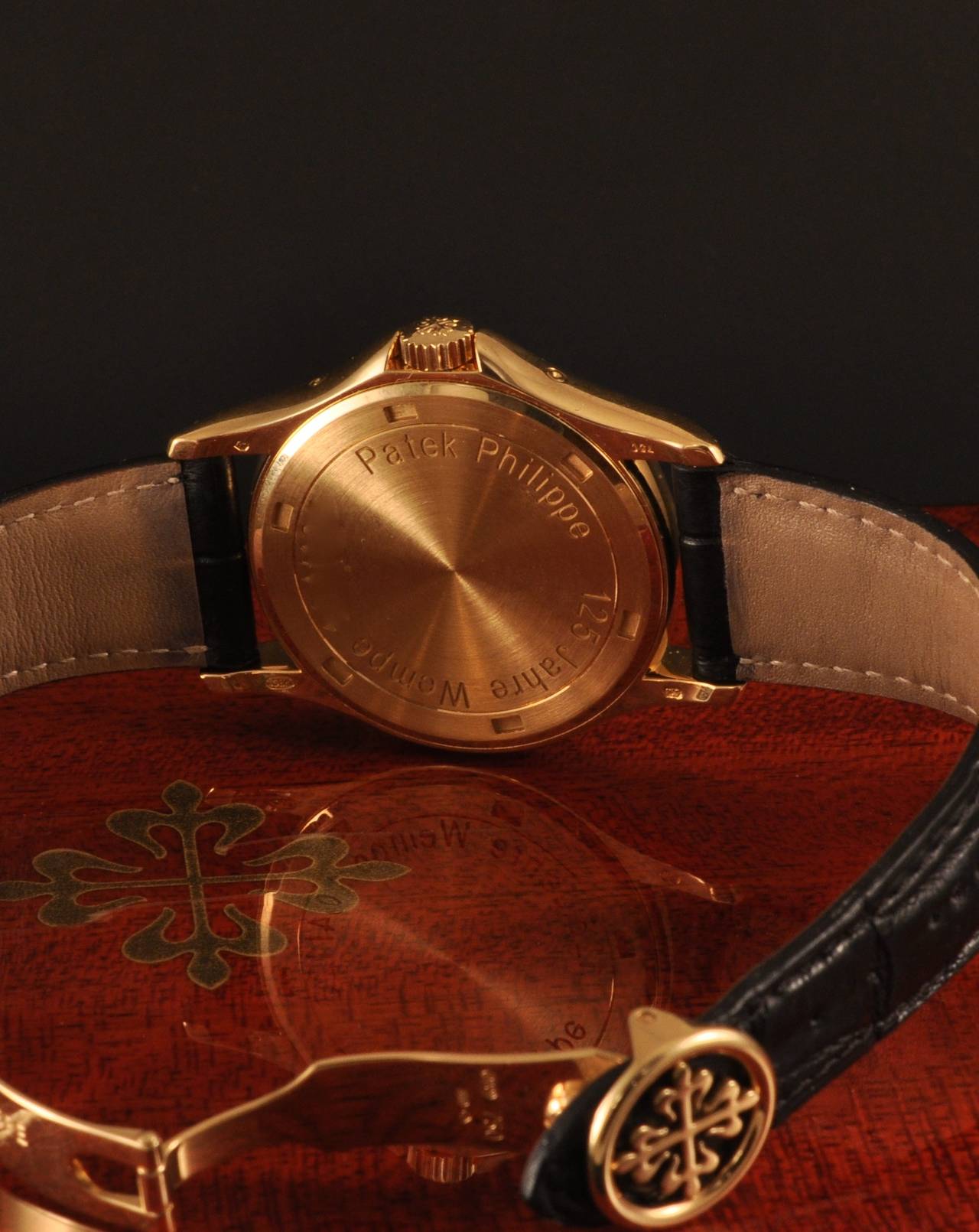 Patek Philippe 18k yellow gold self-winding Annual Calendar wristwatch made for the 125th anniversary of Wempe. Box and Extract from the Archives.