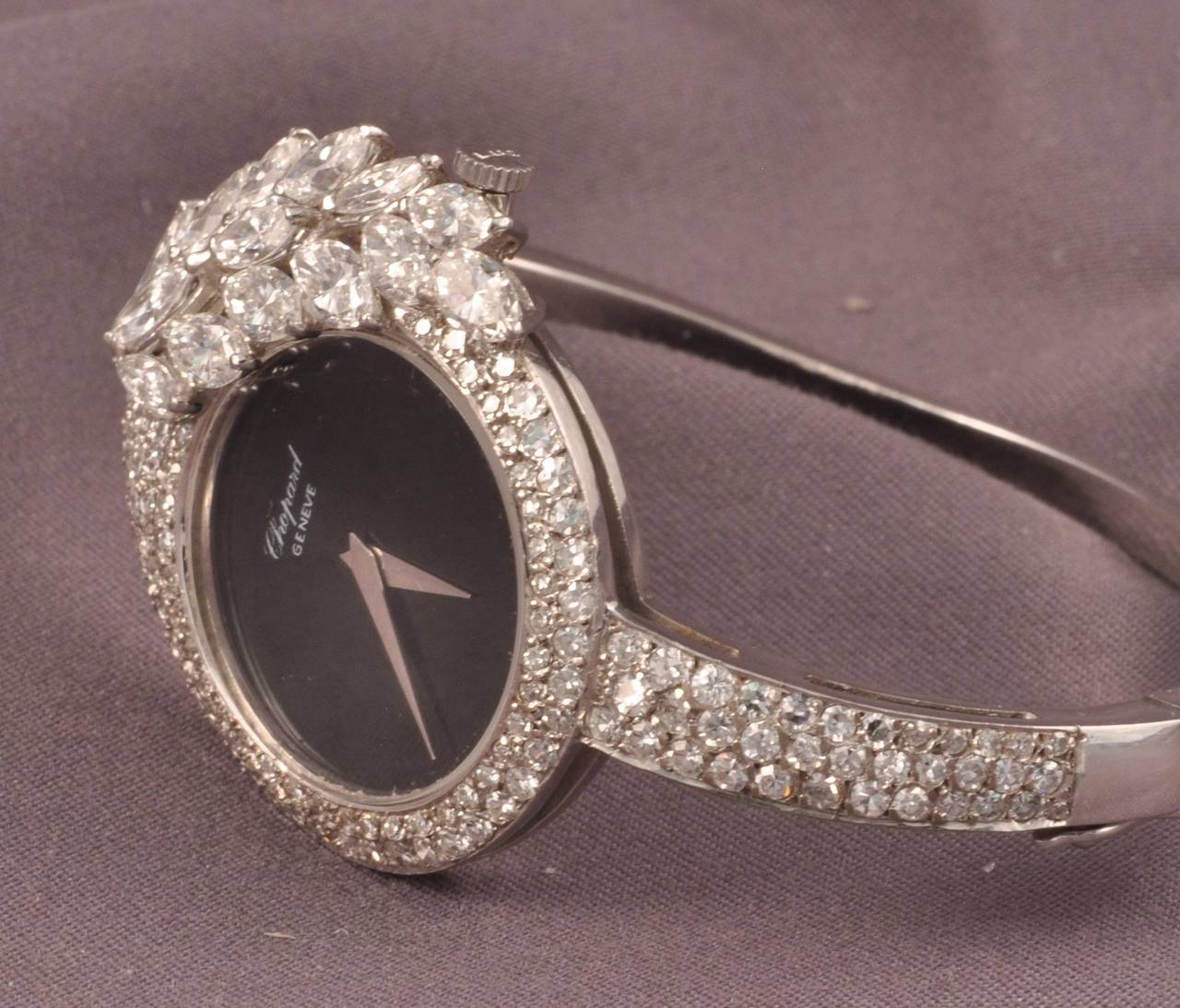 Very rare and fine lady's 18k white gold and diamond set manual winding wristwatch with onyx dial.