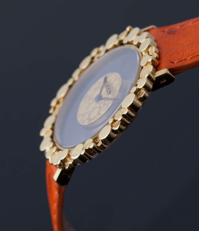 Jaeger-LeCoultre 18k yellow gold manual-wind mystery wristwatch with back-wind crown and unusual bubble-theme bezel and dial.