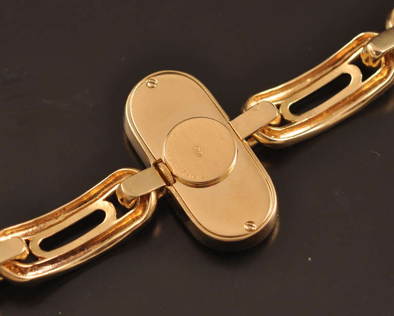 Boucheron lady's 18k yellow gold and diamond-set bracelet watch with manual-wind movement.