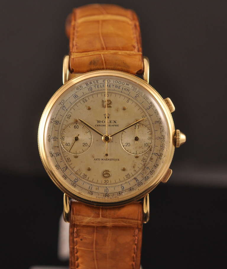 Rolex 18k yellow gold chronograph wristwatch, circa 1945, manual-wind movement, antimagnetic, with register, telemeter and tachometer scales.