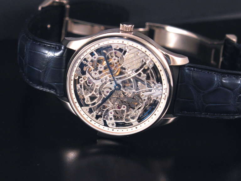 IWC limited edition 18k white gold skeleton minute repeating wristwatch with manual-wind movement, circa 2010. With box and papers.