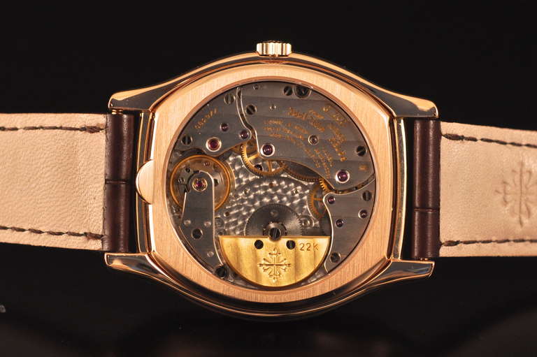 Patek Philippe 18k rose gold perpetual calendar tonneau wristwatch, self-winding movement, Ref. 5040R.