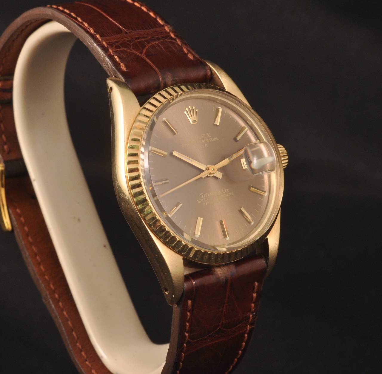 Rare 18k yellow gold self winding wristwatch with Bronze dial and date. Made for Tiffany & Co.
