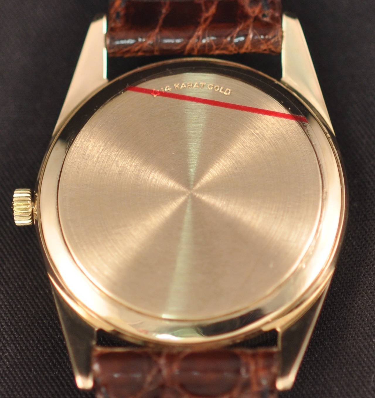 Fine 14k pink gold self winding wristwatch circa 1960s.