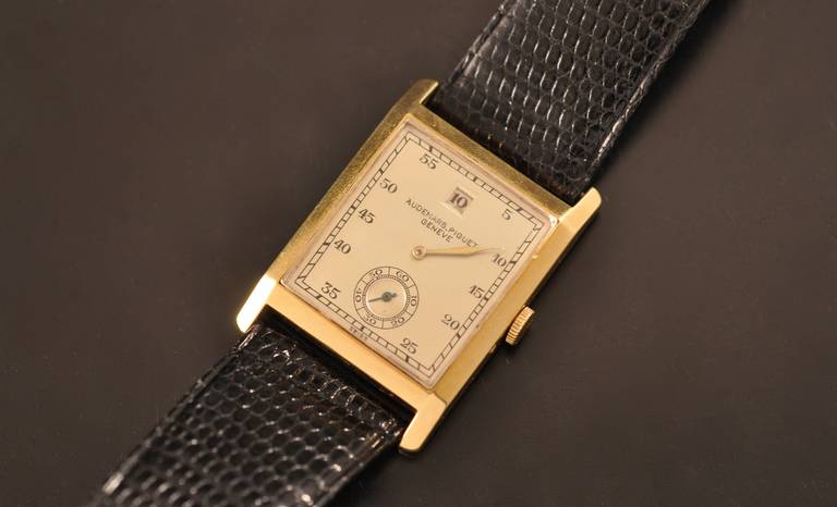 Audemars Piguet 18k yellow gold jump hour wristwatch, manual-wind movement.