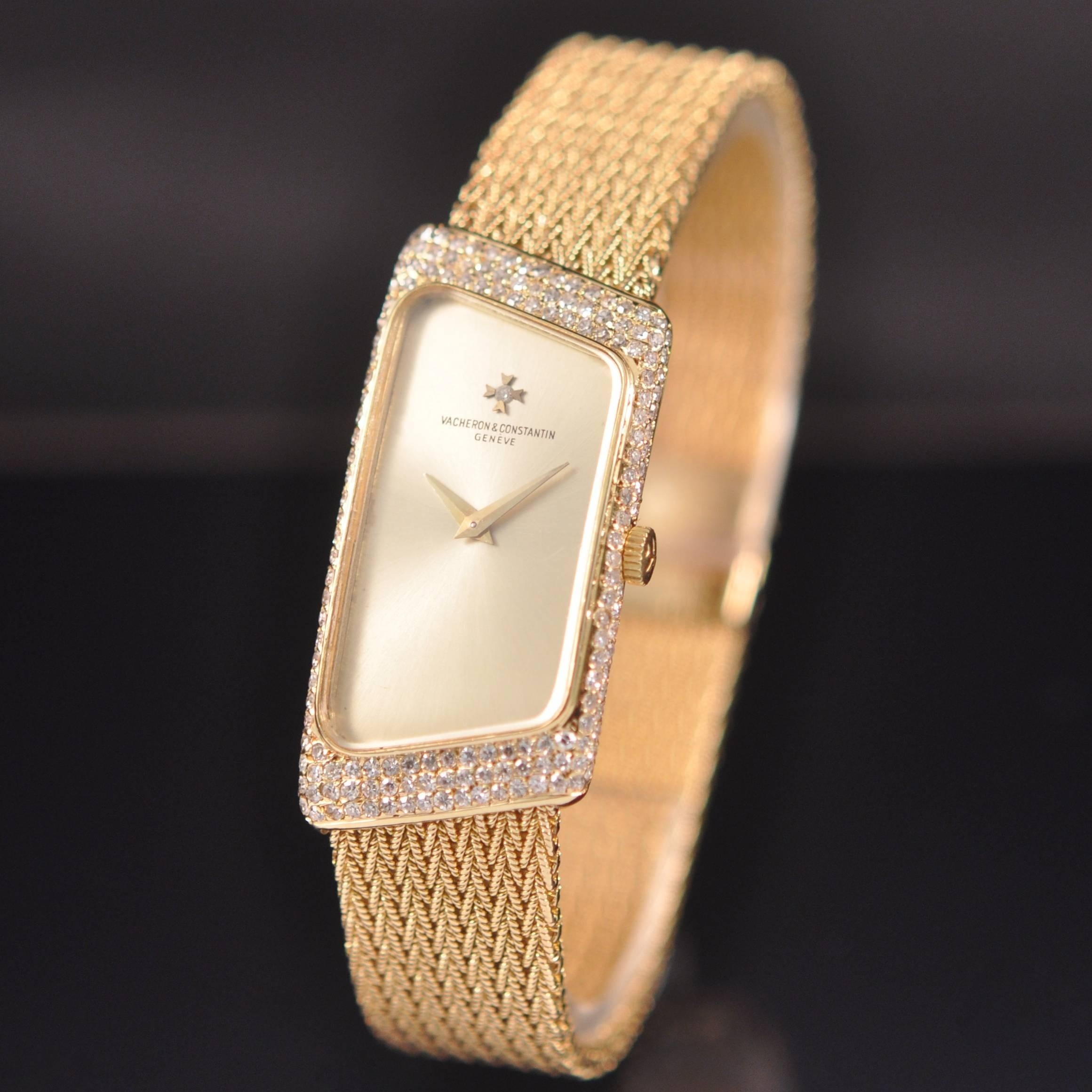 Elegant yellow gold manual winding movement. lady wristwatch with a diamond set bezel. 