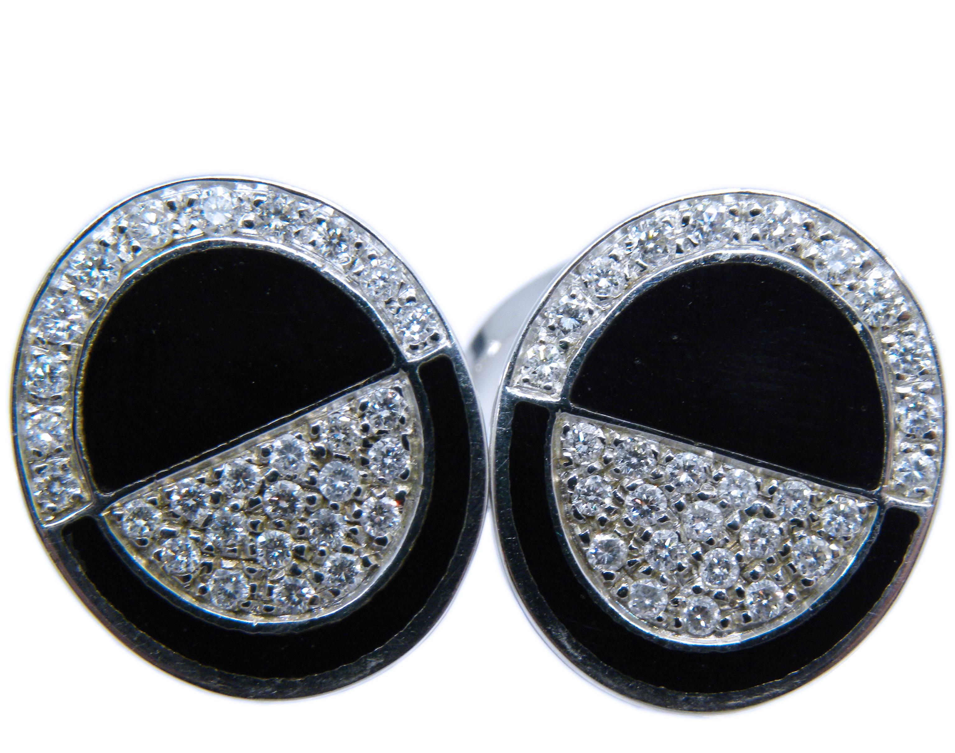 Smart, Chic yet Timeless Black and White Cufflinks, Art Déco Style, featuring 0.70 Carat Top Quality White Diamond in an 18Kt White Gold Black Hand Enamelled Setting.
In our fitted suede leather case and pouch.

