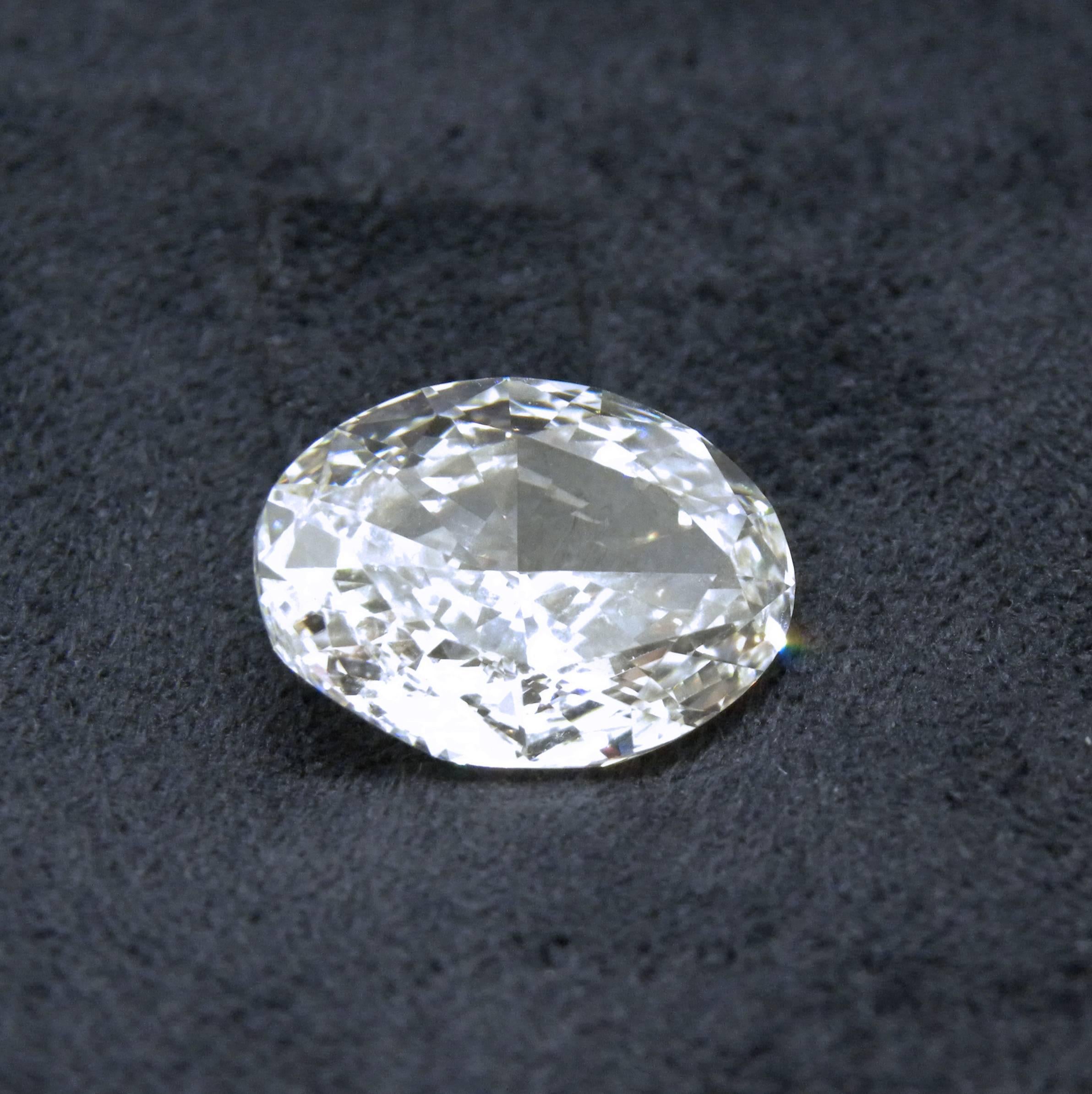HRD Certified Natural 5.01 Carat H IF Oval Cut White Diamond 4