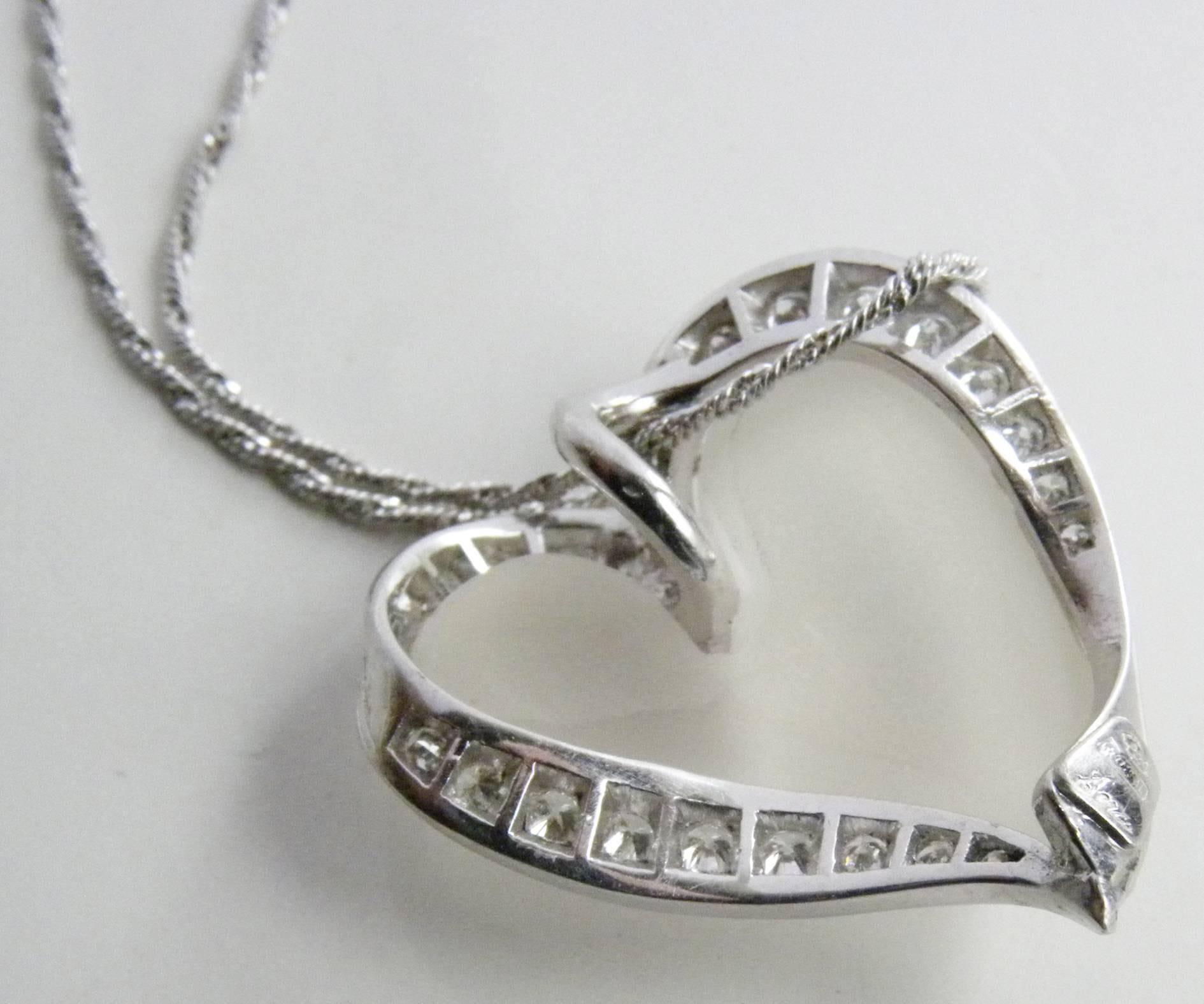 Brilliant Cut Berca 0.56 Karat White Diamond Hand Inlaid Rock Crystal Platinum Heart Pendant For Sale
