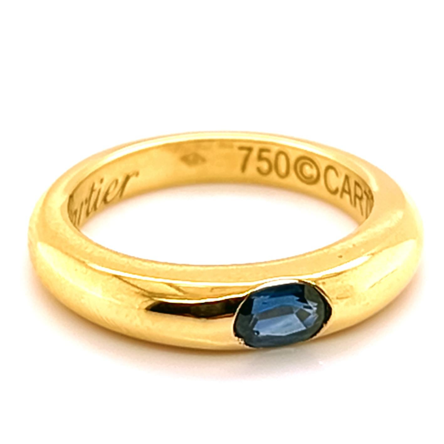 Original 1992, Cartier Oval Royal Blue Sapphire 18Kt Gelbgold ikonischen Ellipse Ring, Französisch Größe 54, US Größe 6 3/4.
Eine sehr wertvolle Cartier circa 0,60 KT Top Qualität Oval Saphir in einem einfachen, alle Zeit tragbar 18kt Gelbgold