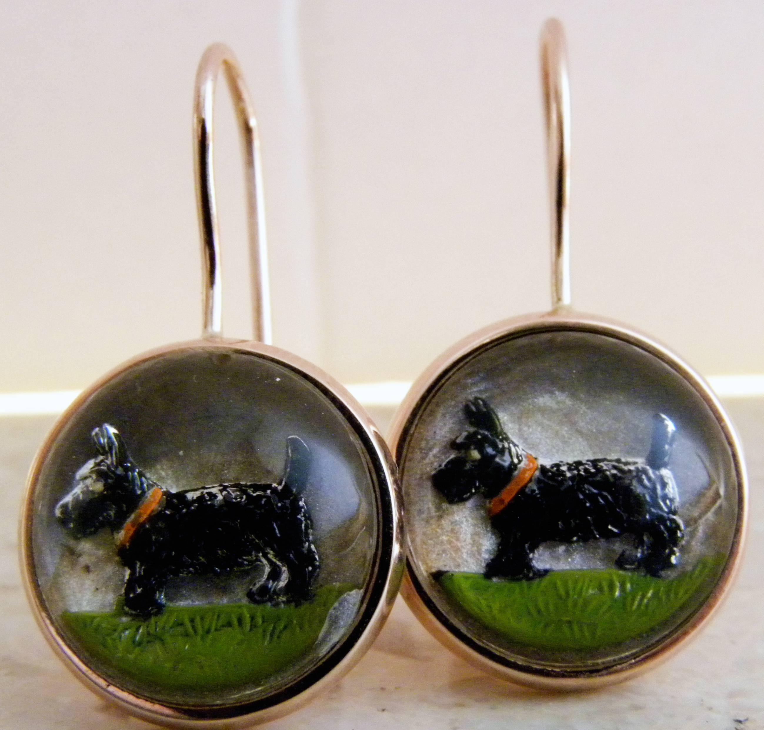 Essex or Reverse Painting Under Crystal Earrings featuring  a West Highland Black Terrier image, 9k rose gold setting.
During the fifties Giovanni Berca used to collect Essex Glasses and create unique pieces of jewelry for his family and friends.
We