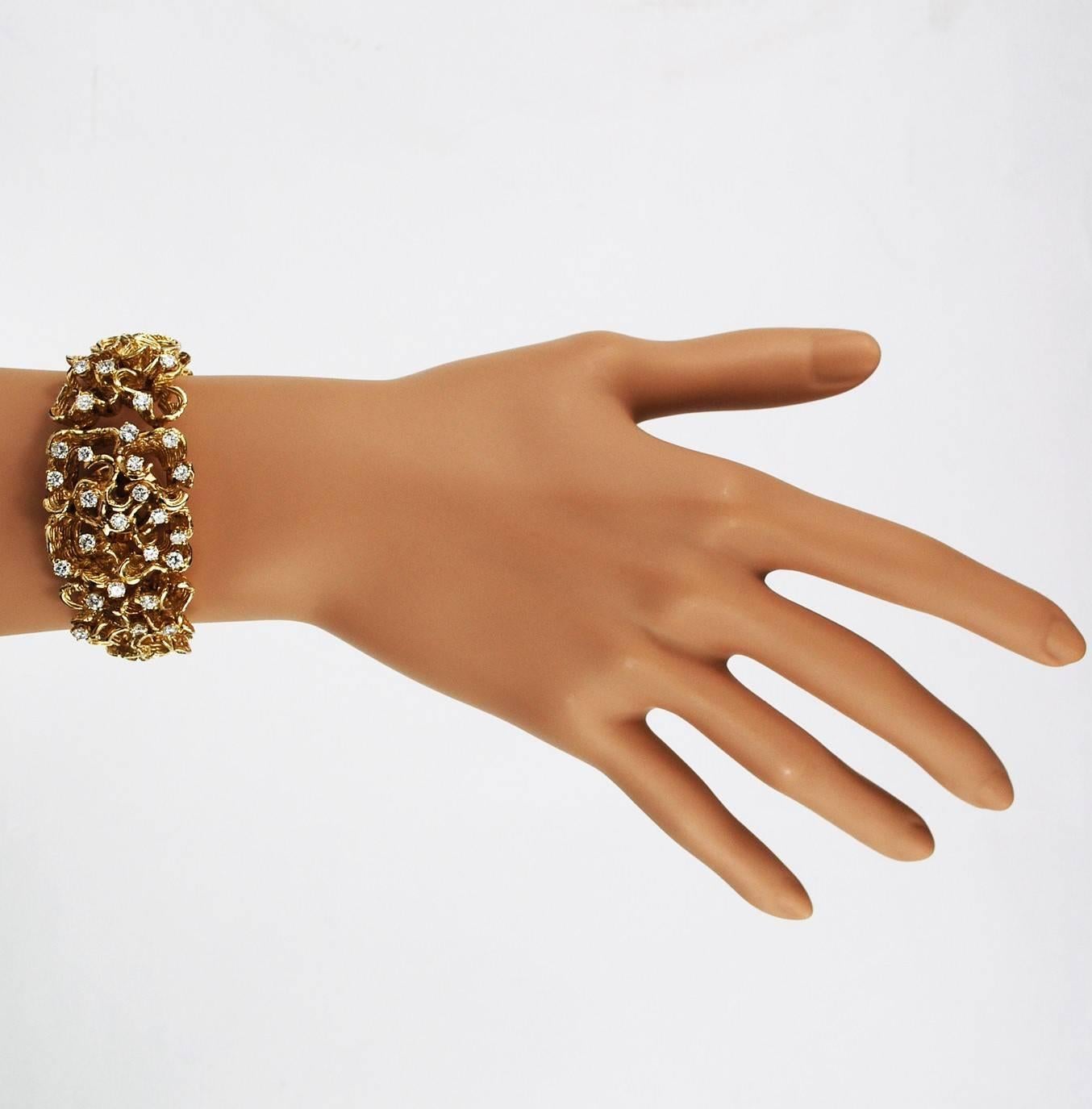 Women's or Men's Modernist 14 Karat Yellow Gold Diamond Bracelet Hidden Watch  circa 1960 For Sale